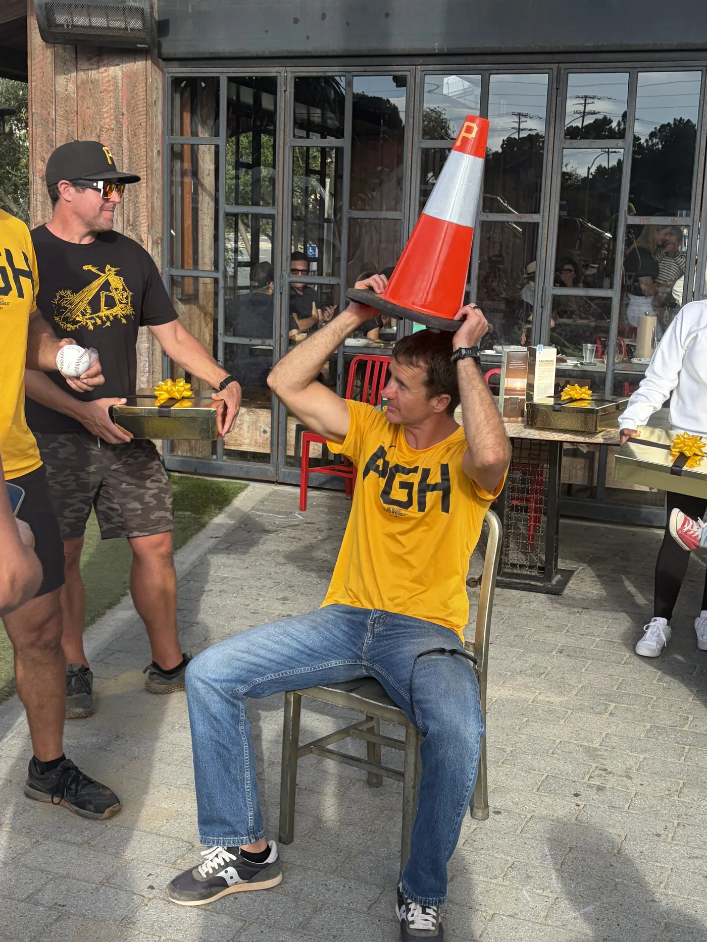 Pirates player hoisting the cone